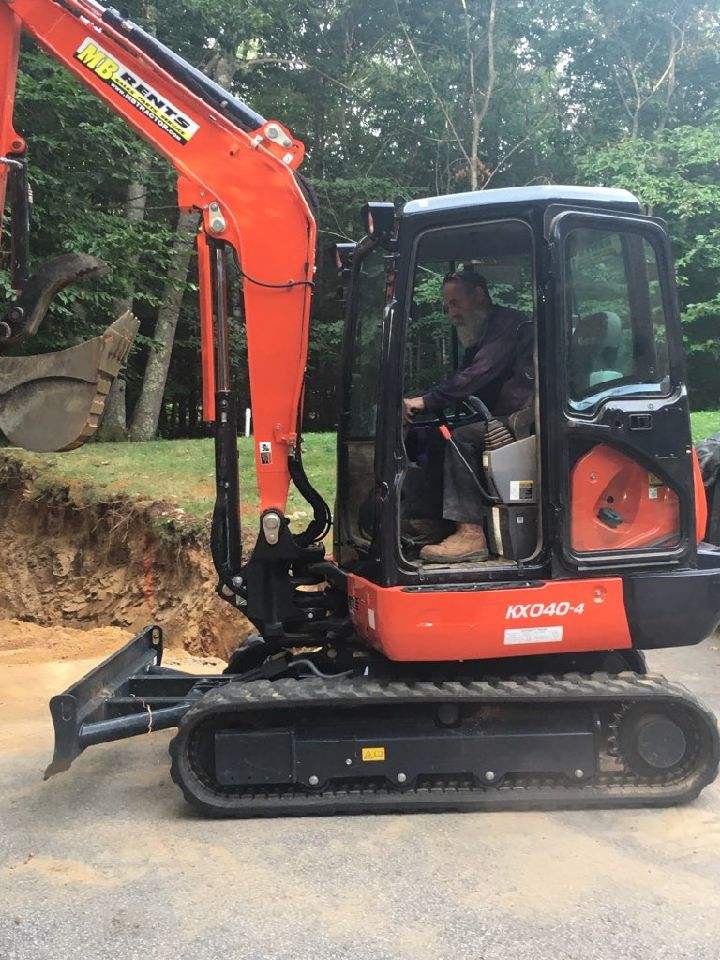 Professional Worker Operating Excavator