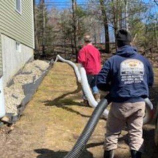 Workers Laying a Huge Pipe