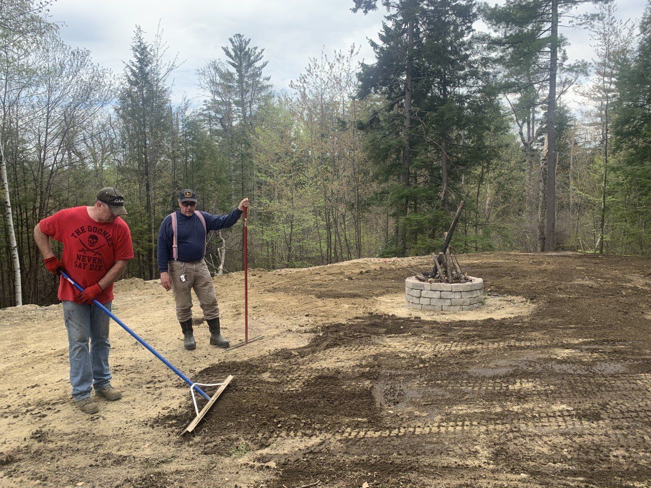 Worker Grading Fireplace