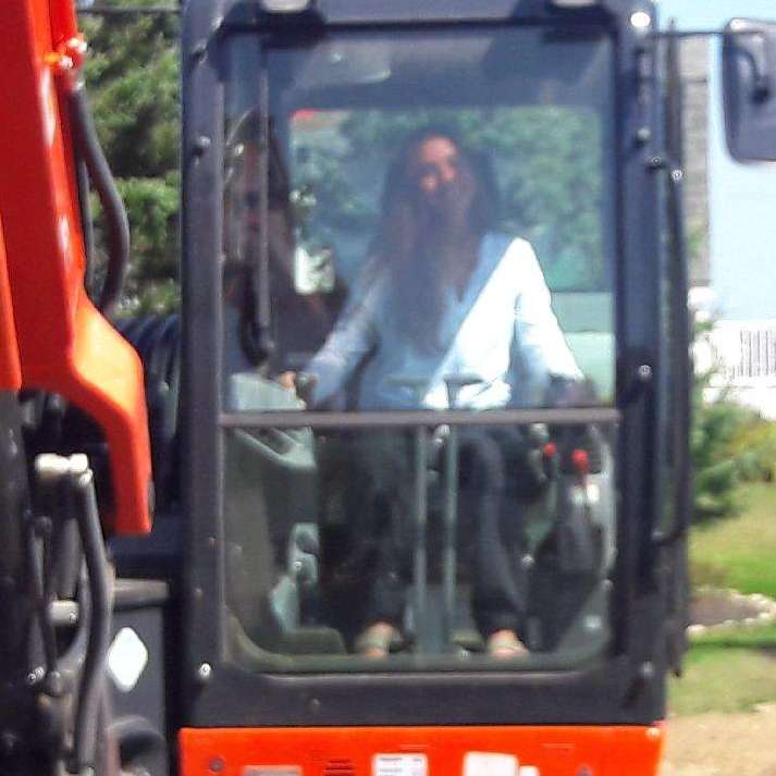 A Woman Operating Excavator