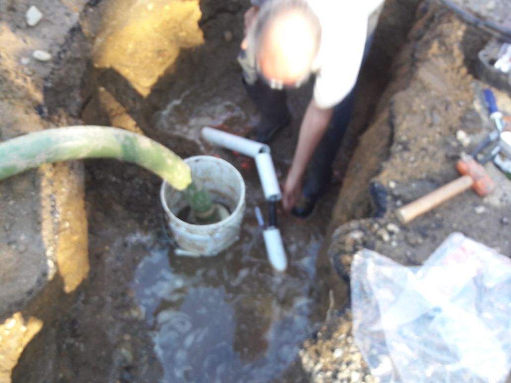 Worker Fixing Broken Pipe Line