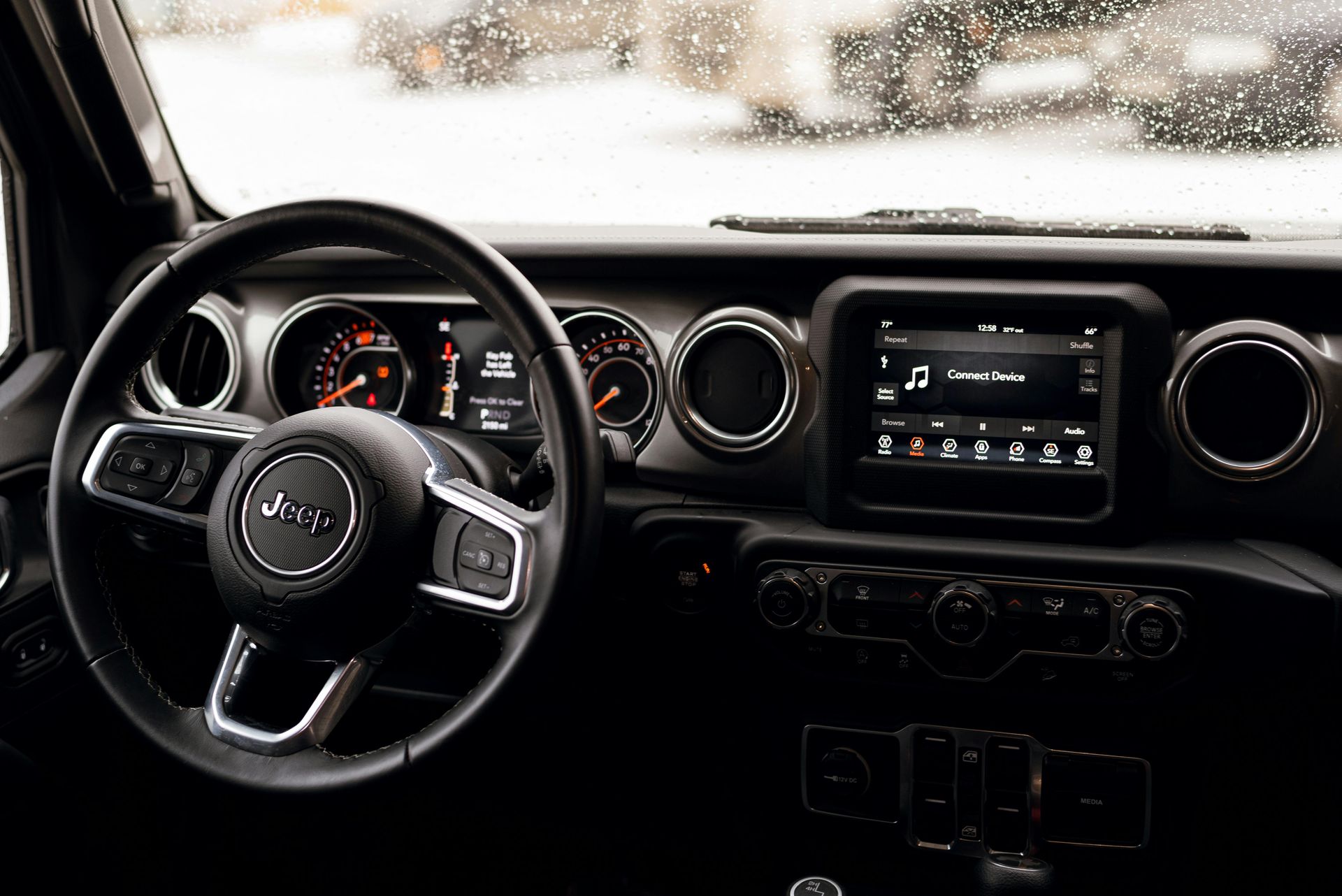 driver's view of steering wheel and dashboard, power steering warning signs AutoWits Scottsdale