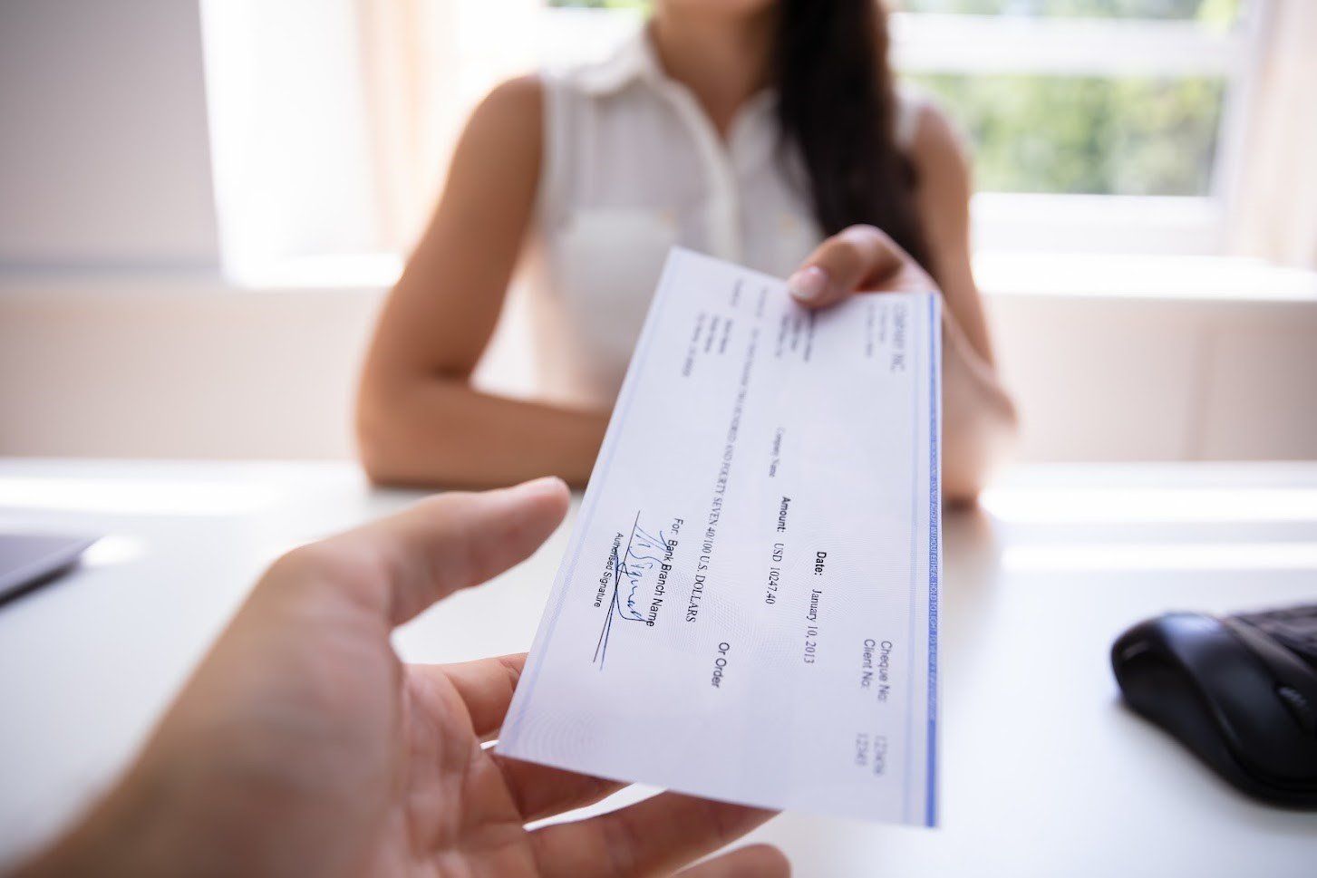 Paying Check — Claire, WI — Cohen Law Offices LLC Paying Check — Claire, WI — Cohen Law Offices LLC
