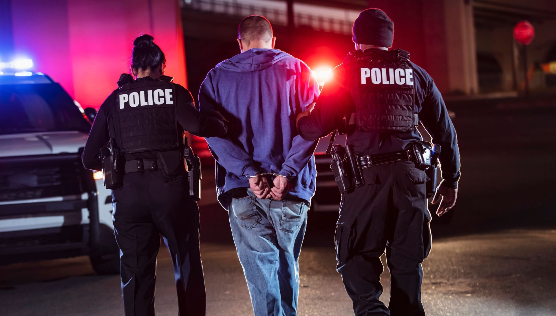 Police Arresting a Juvenile — Eau Claire, WI — Cohen Law Offices Police Arresting a Juvenile — Eau Claire, WI — Cohen Law Offices
