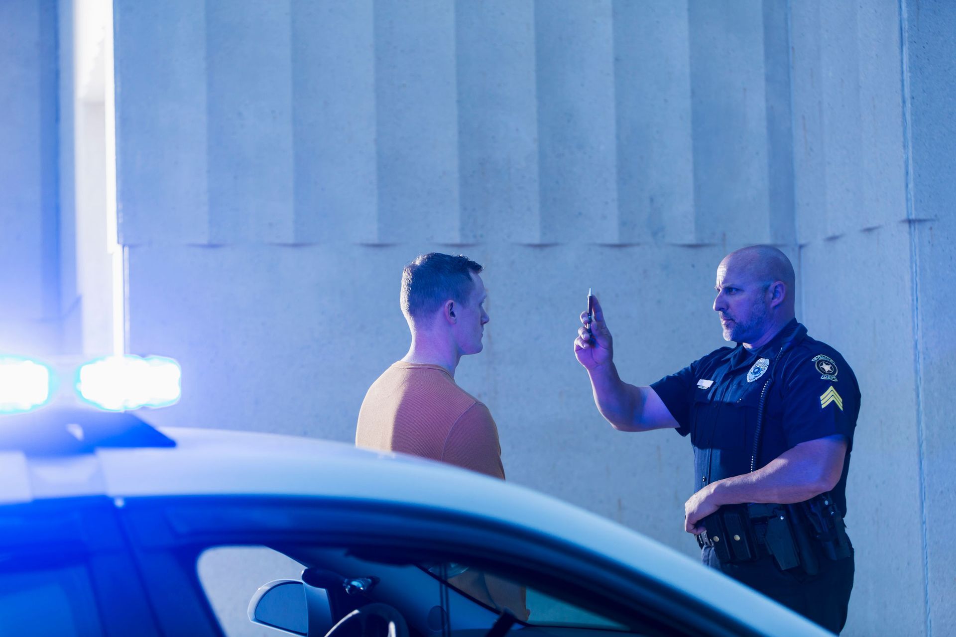 Police Officer Giving a Sobriety Test — Eau Claire, WI — Cohen Law Offices Police Officer Giving a Sobriety Test — Eau Claire, WI — Cohen Law Offices