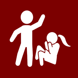 A man is standing next to a girl who is sitting on the ground.