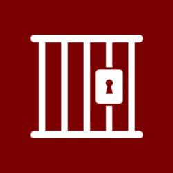 pic of bars in a jail with a lock