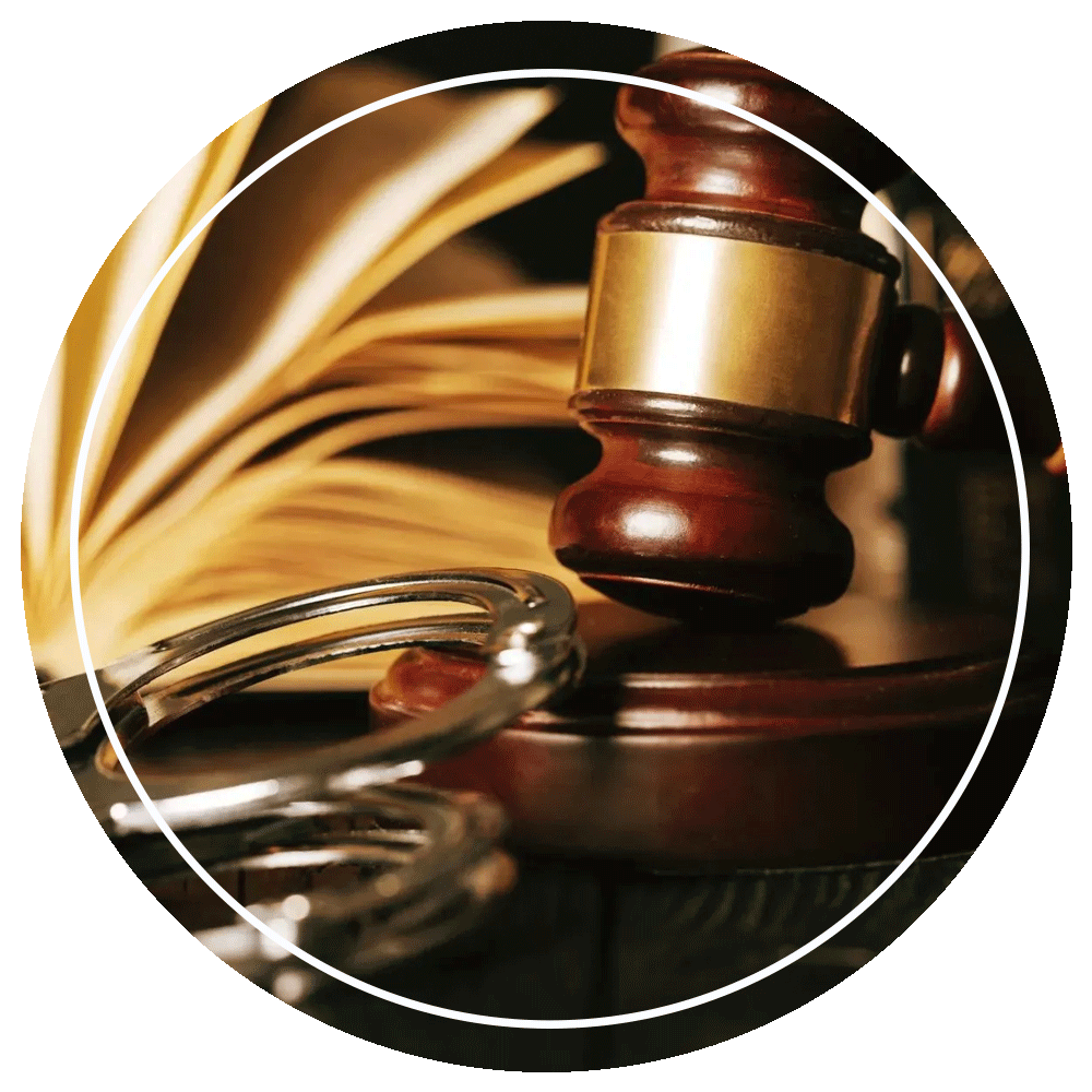Judge Gavel and Handcuffs on Wooden Desk — Eau Claire, WI — Cohen Law Offices Judge Gavel and Handcuffs on Wooden Desk — Eau Claire, WI — Cohen Law Offices