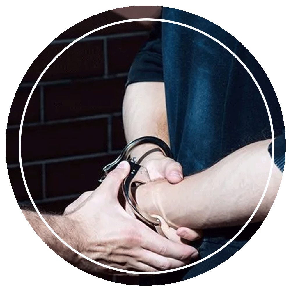 Criminal Handcuffed By A Policeman — Eau Claire, WI — Cohen Law Offices, LLC Criminal Handcuffed By A Policeman — Eau Claire, WI — Cohen Law Offices, LLC