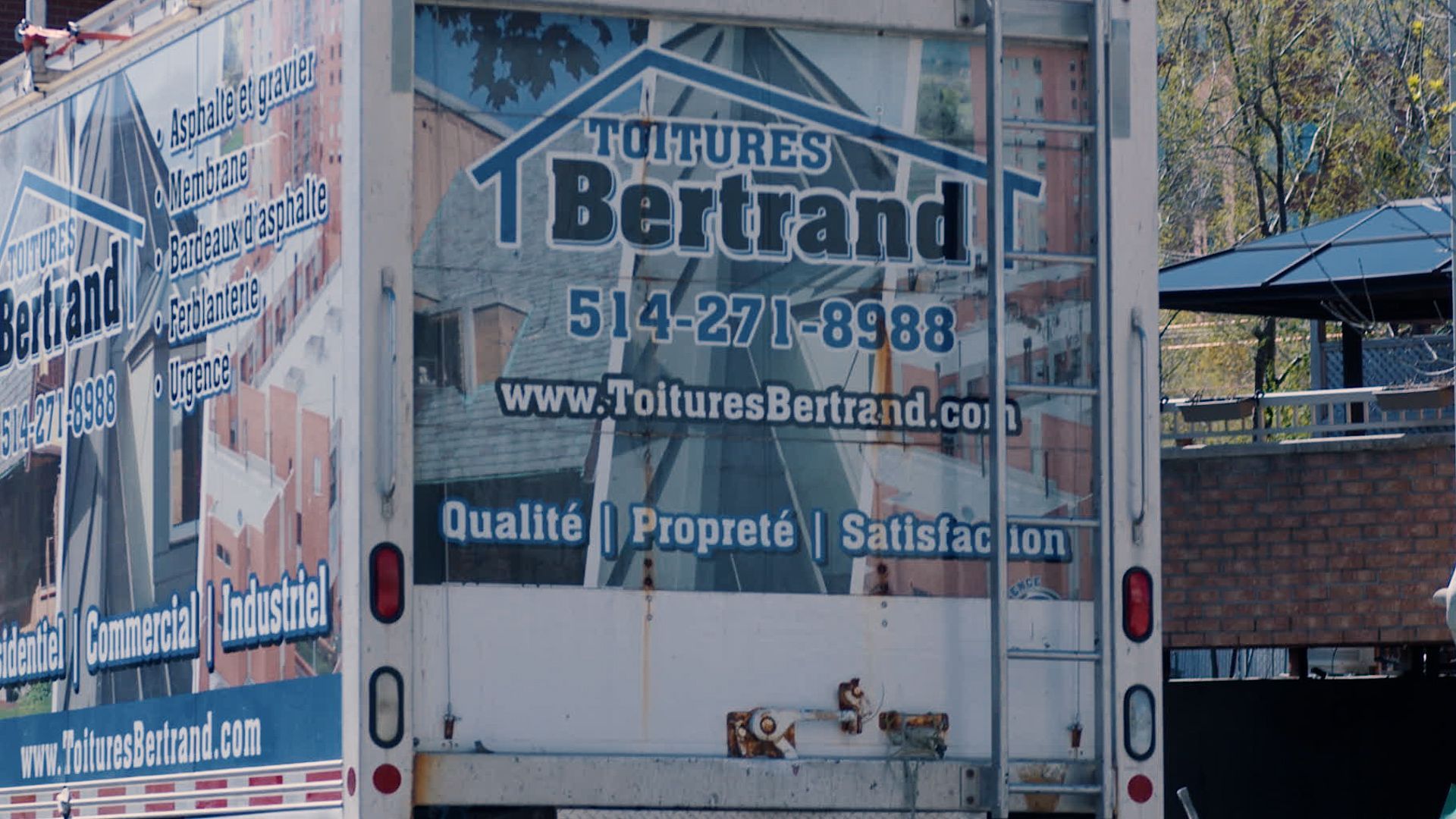 The back of a truck with the word bertrand on it