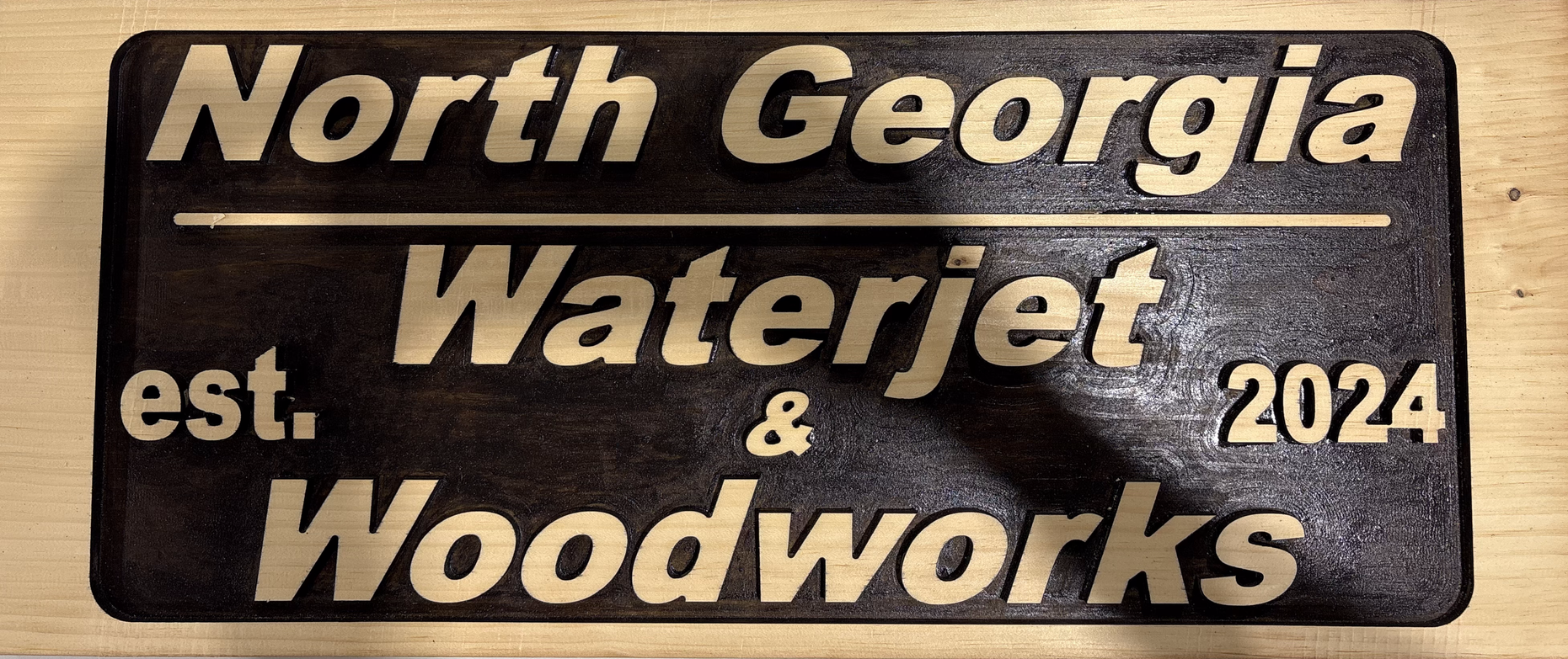 Reverse carved sign 