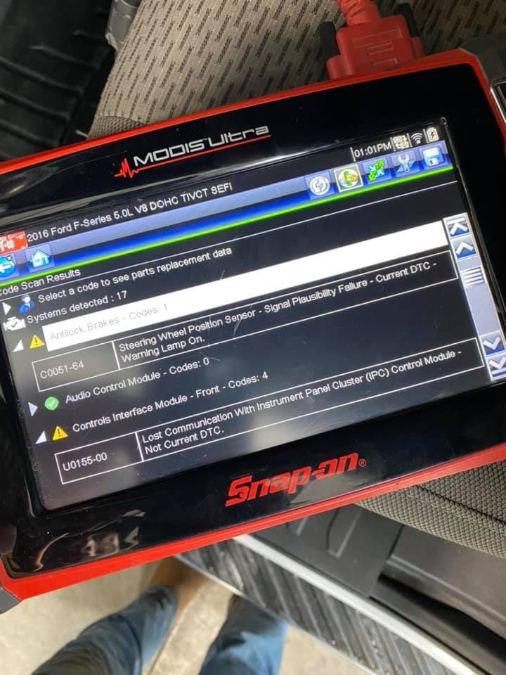 A diagnostic tool displaying error codes from a 2016 Ford F-Series truck.