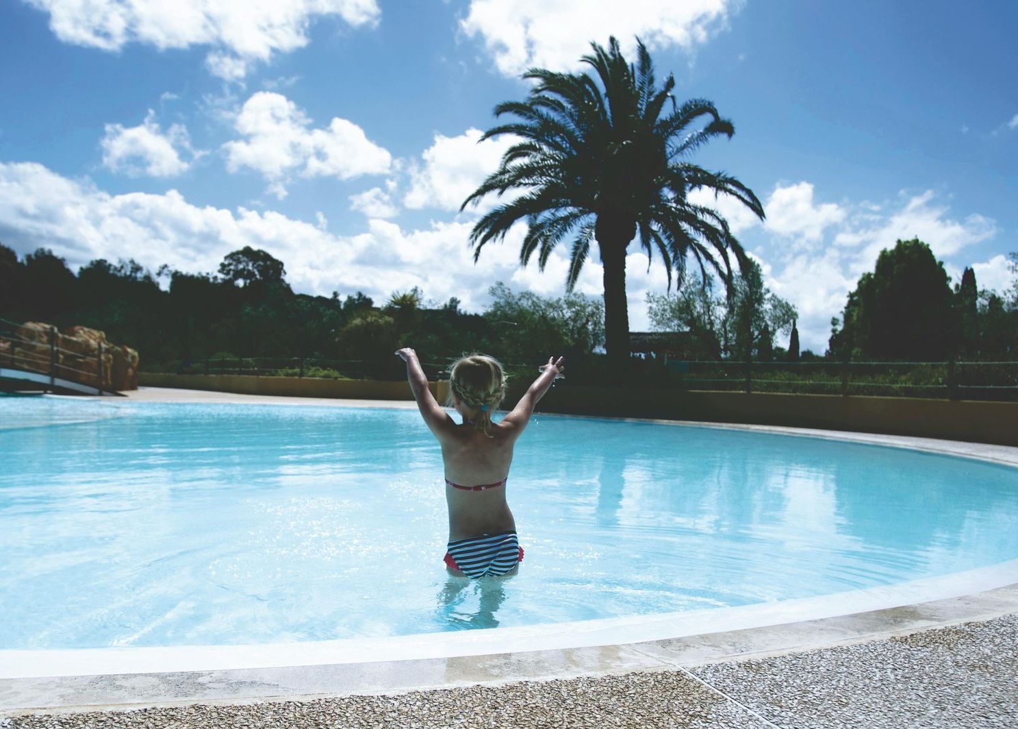 Child swimming in pool in Norfolk VA