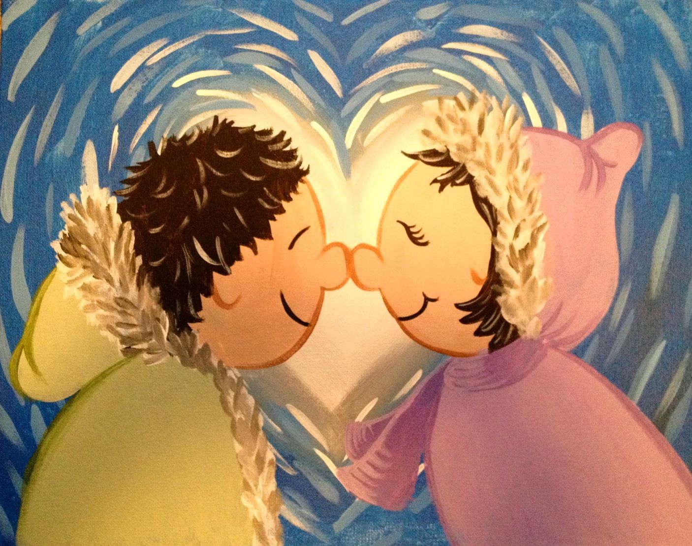 A boy and a girl kissing in front of a heart