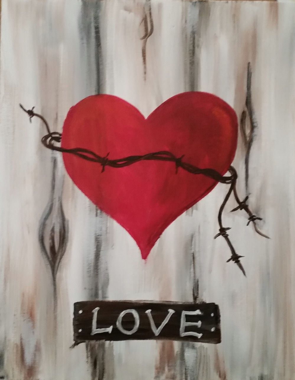 A painting of a heart with barbed wire around it and a sign that says love