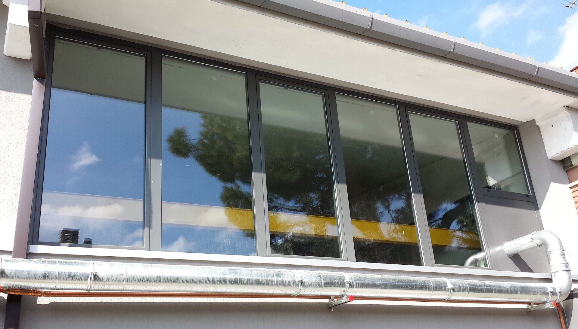 chiusura con infisso di un terrazzo