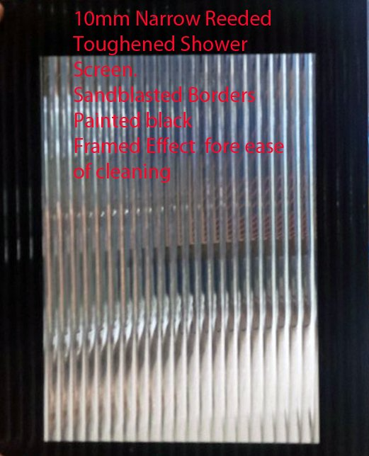 Text on a shower screen sample with vertical frosted ridges and a black frame.