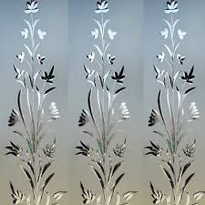 Vertical floral wall pattern in gray with white leaves and black bird silhouettes
