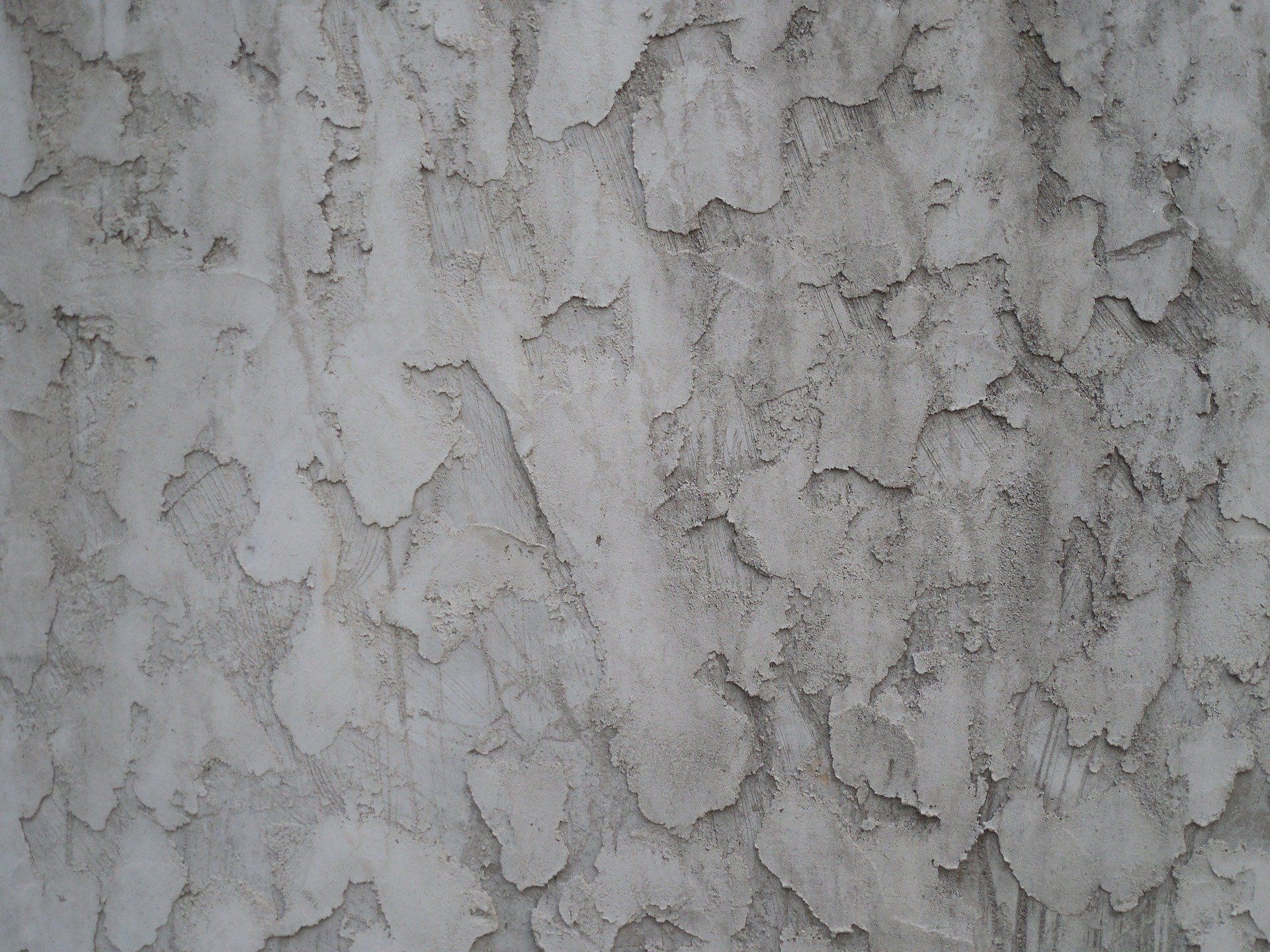 grey stucco EIFS wall