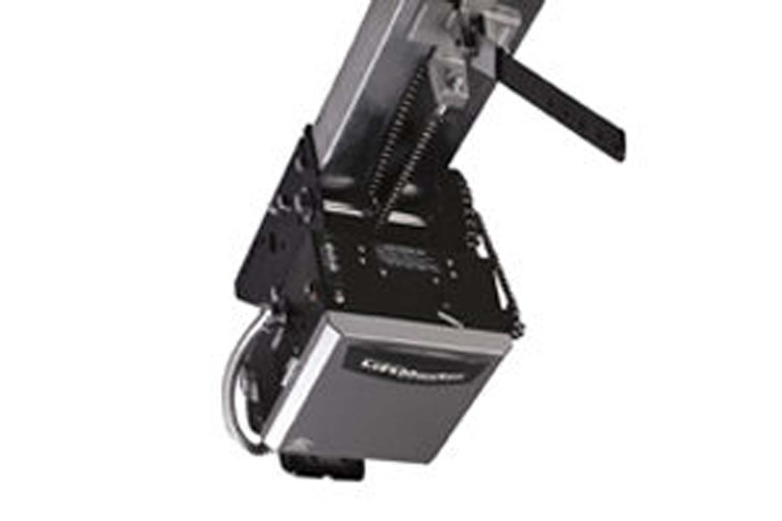 A close up of a garage door opener on a white background.