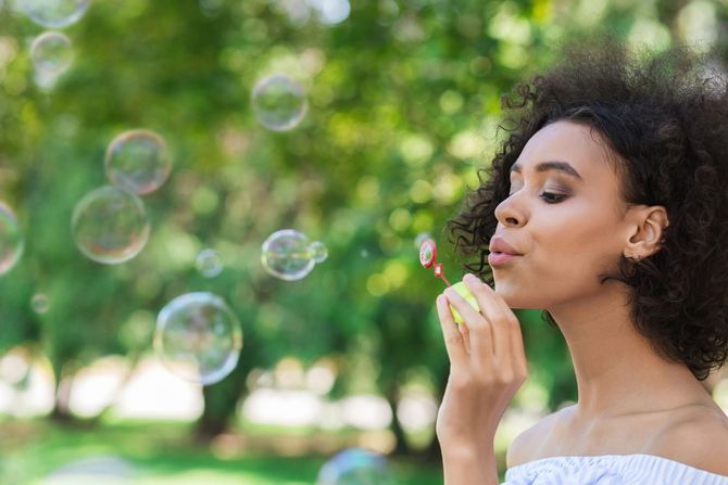 Woman Blowing Bubbles