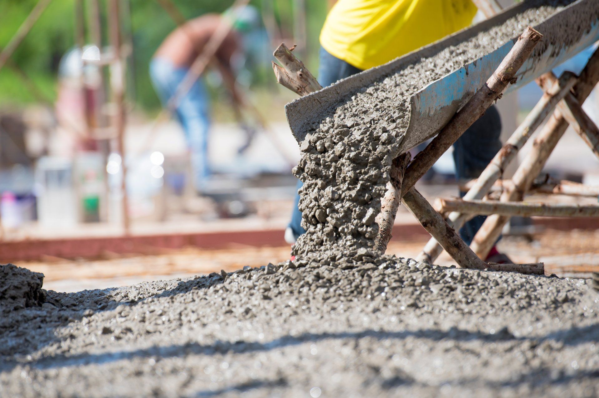 Concrete being poured by Moses Paving and Asphalt Repair LLC