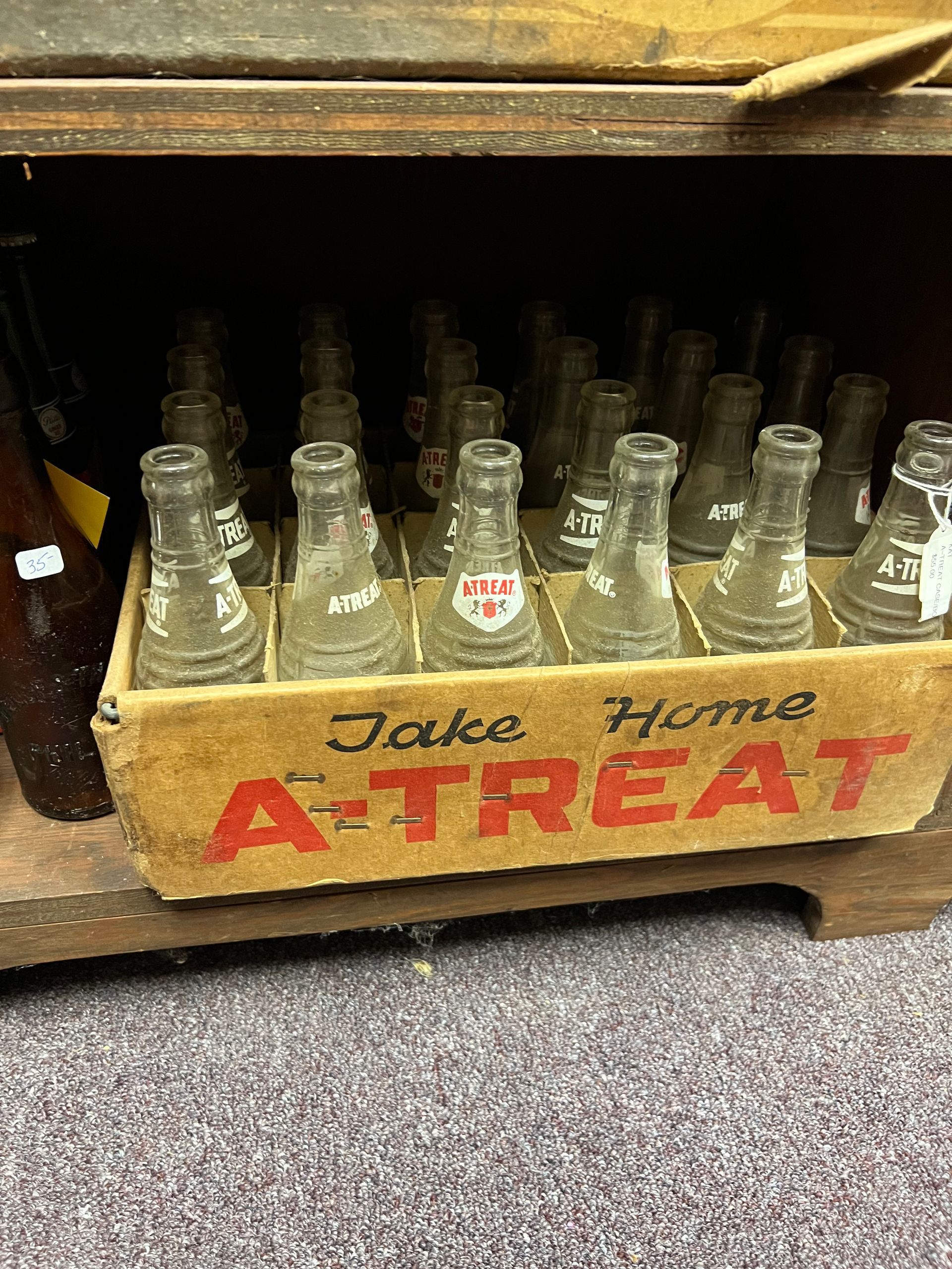 Antique A-Treat Glass soda bottles
