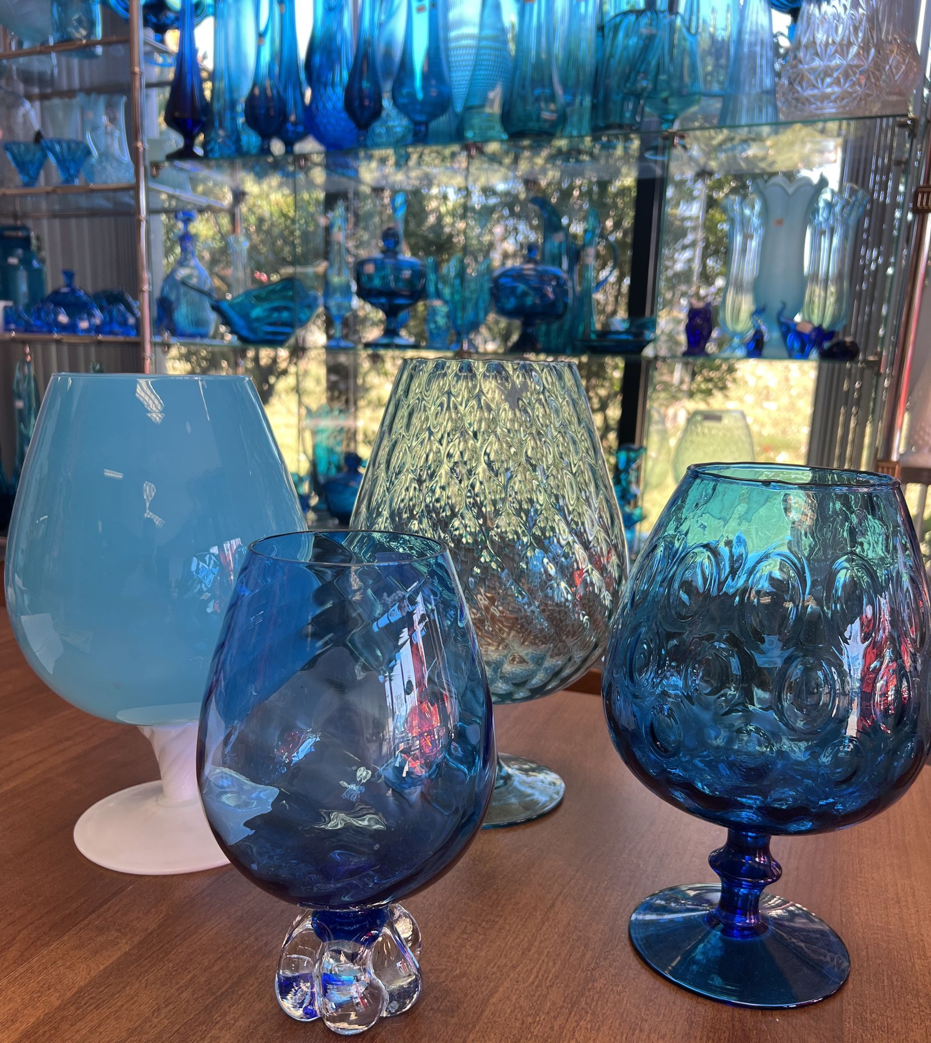 A group of blue swung glasses