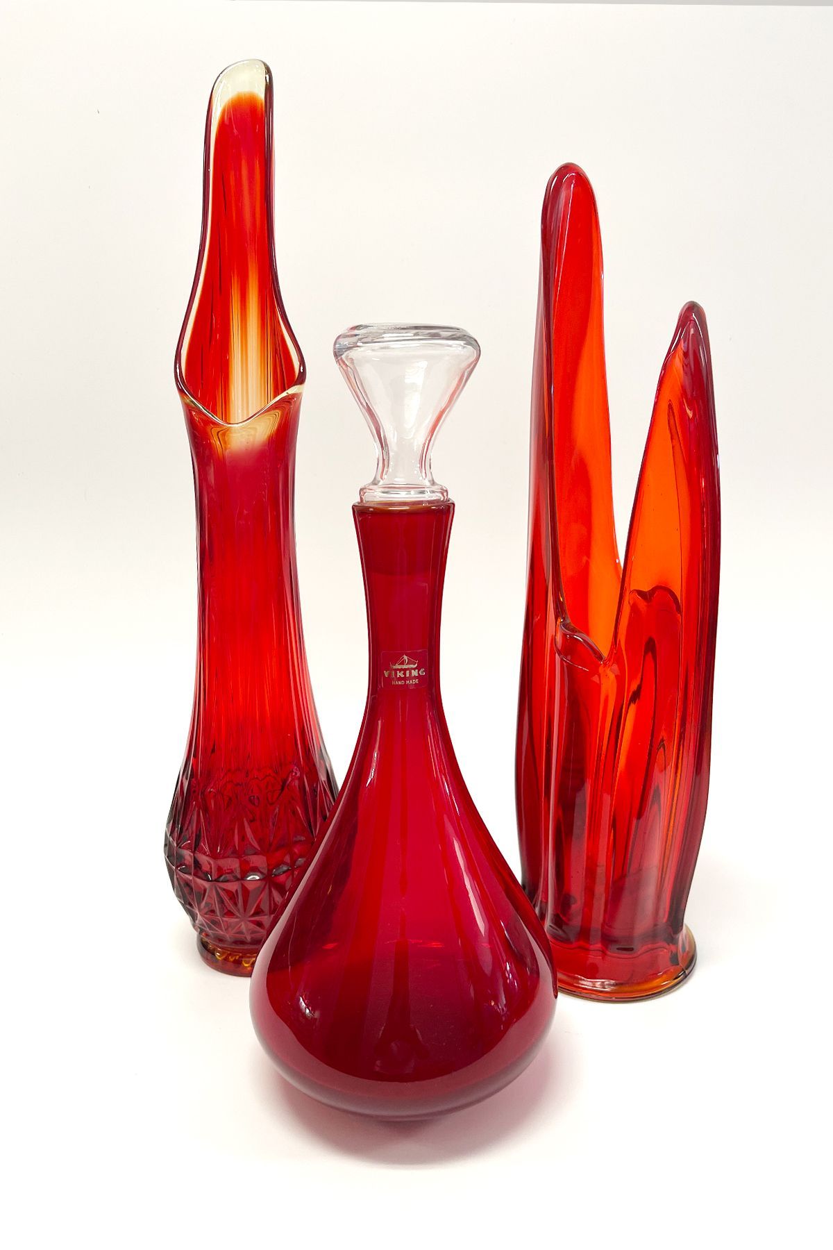 Swung persimmon vases and decanter