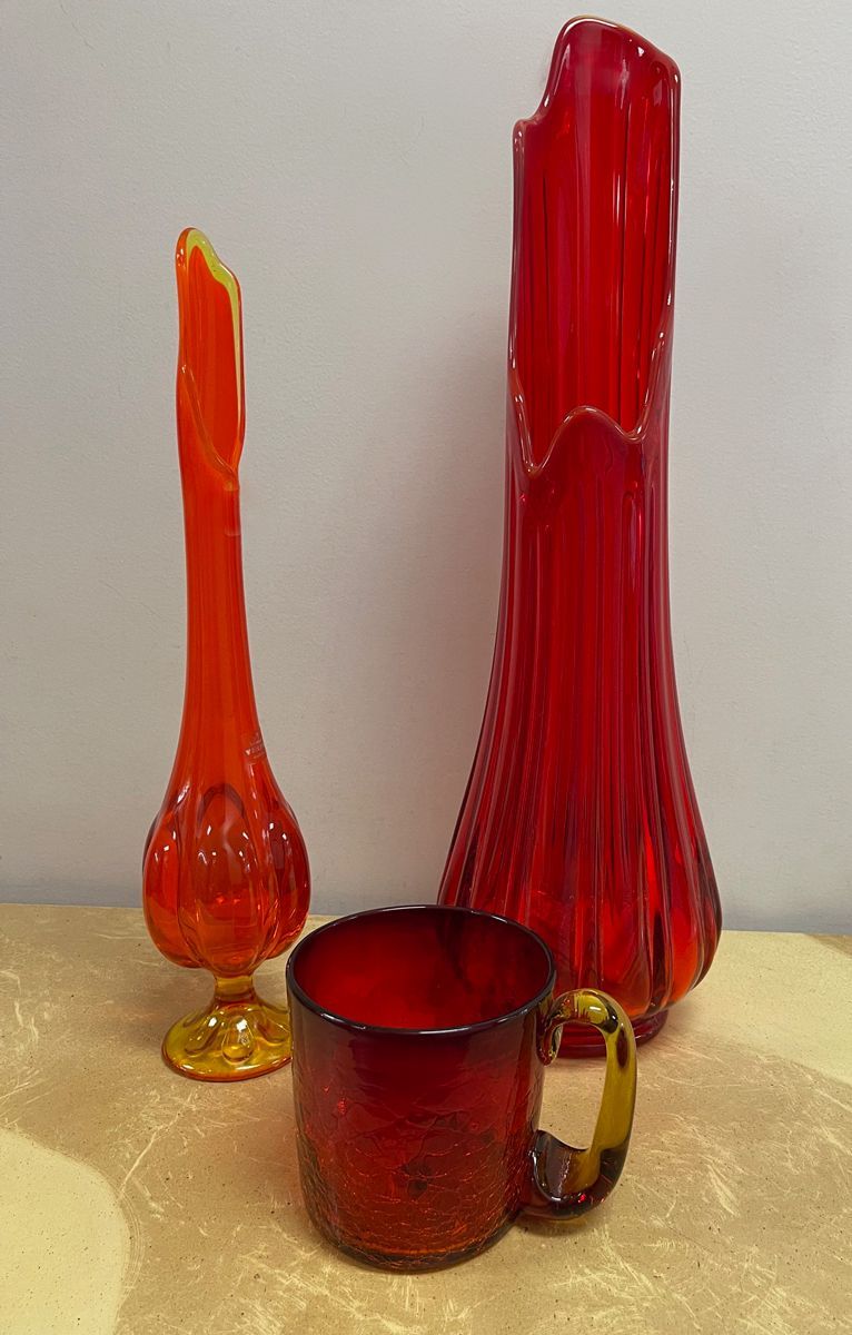 Two red vintage swung vases