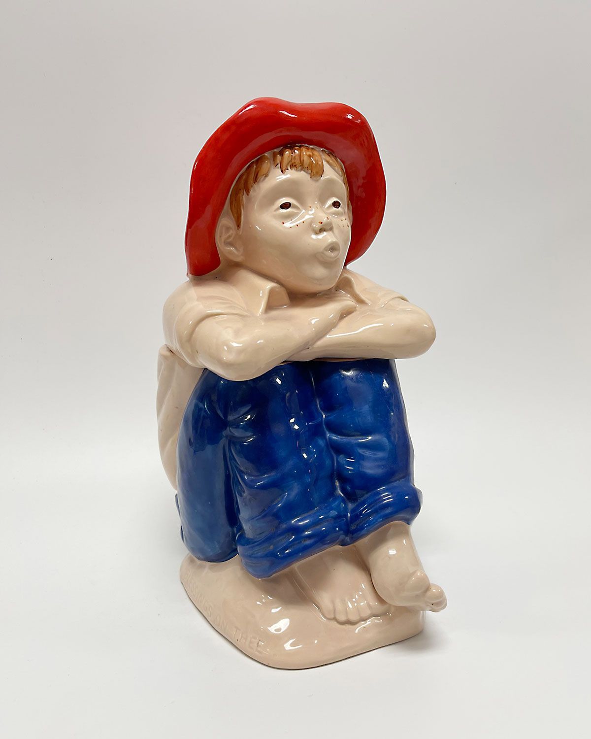 Vintage young boy figurine