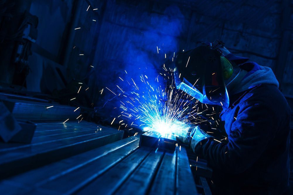 Welder in Protective Gear — Sheetmetal Improvements & Design in Burleigh Heads, QLD