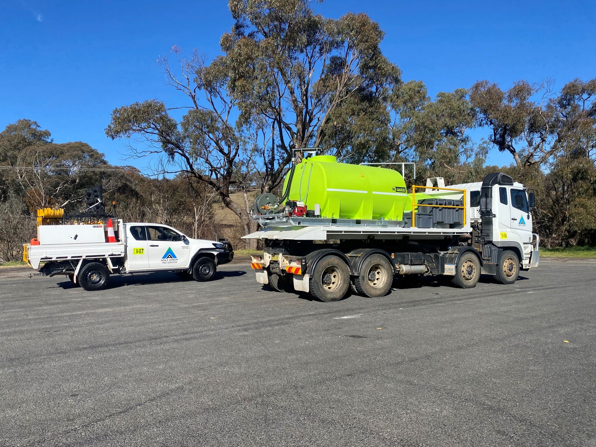 Black and White Agile Arbor Tree Services Truck on a Dirt Road — Agile Arbor Pty Limited in Kelso, NSW