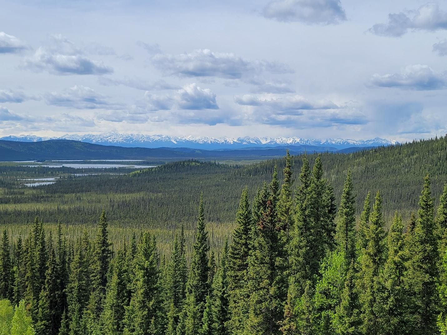 view of the mountain range from the deck of the Tetlin Wildlife Refuge Visitor Center, Yukon, Canada