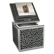 Decorative silver cube box with textured sides and a hinged lid showing a small figurine