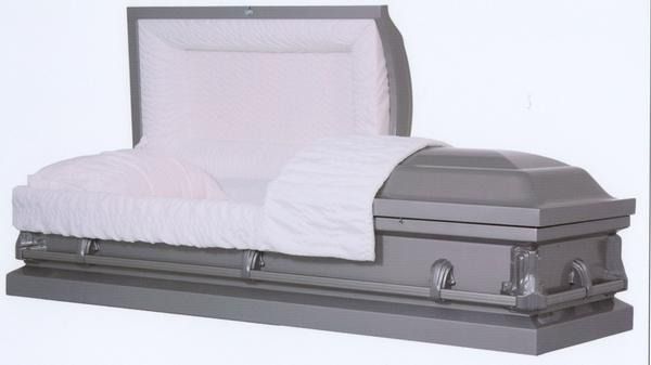 White coffin with lid open, lined in pink satin, shown on a gray base against a white background
