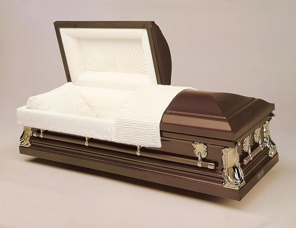 Brown wooden casket with open lid and white satin interior on a plain background