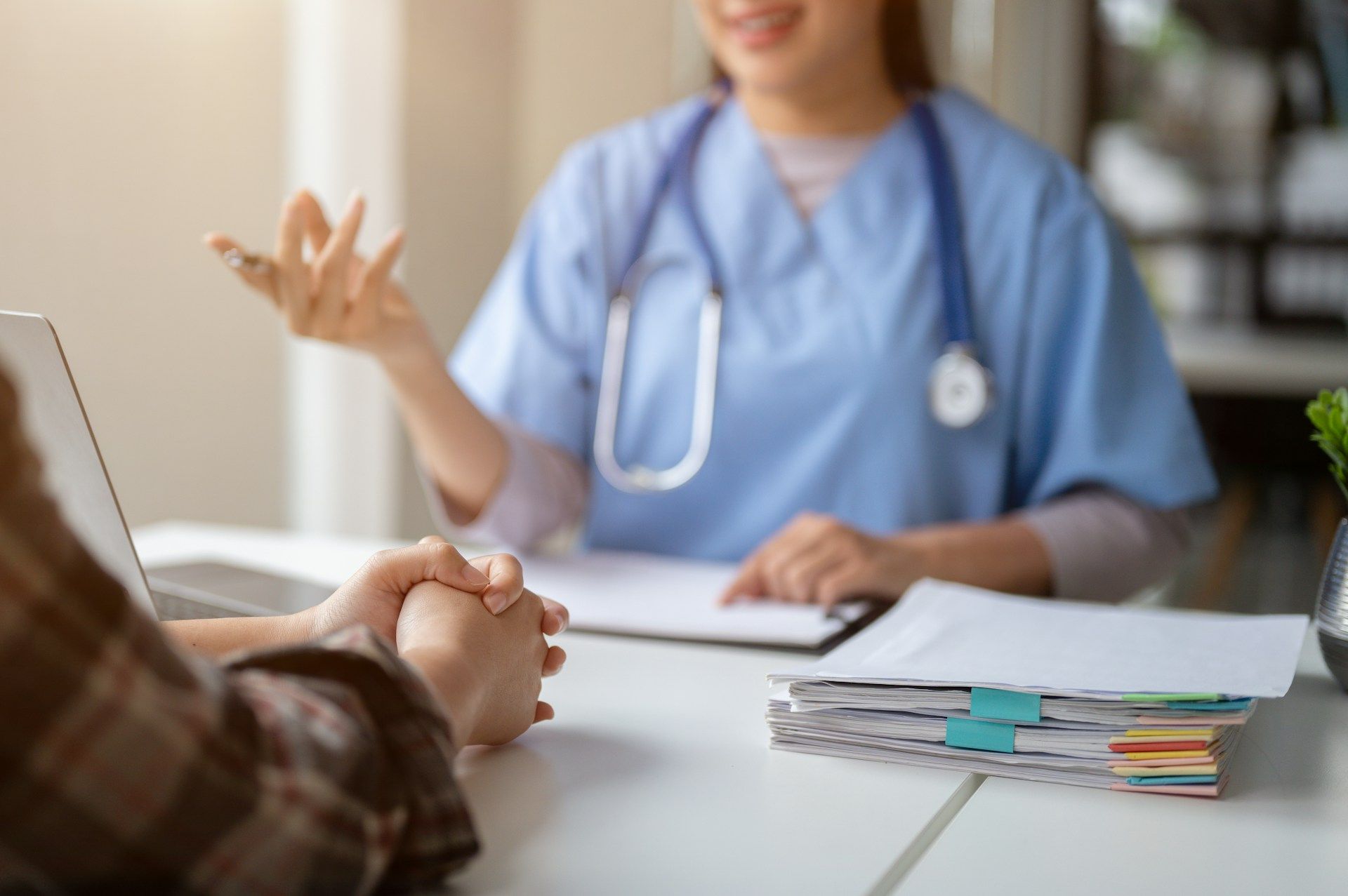 A doctor consulting with a patient