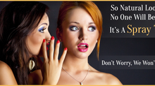 Two women are whispering into each other's ear about spray tans in St. Louis