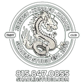 A black and white drawing of a dragon in a circle.