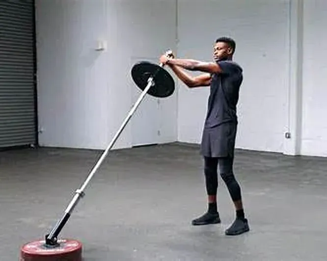 Boxer using cable wood chop exercises to improve rotational strength and core stability.
