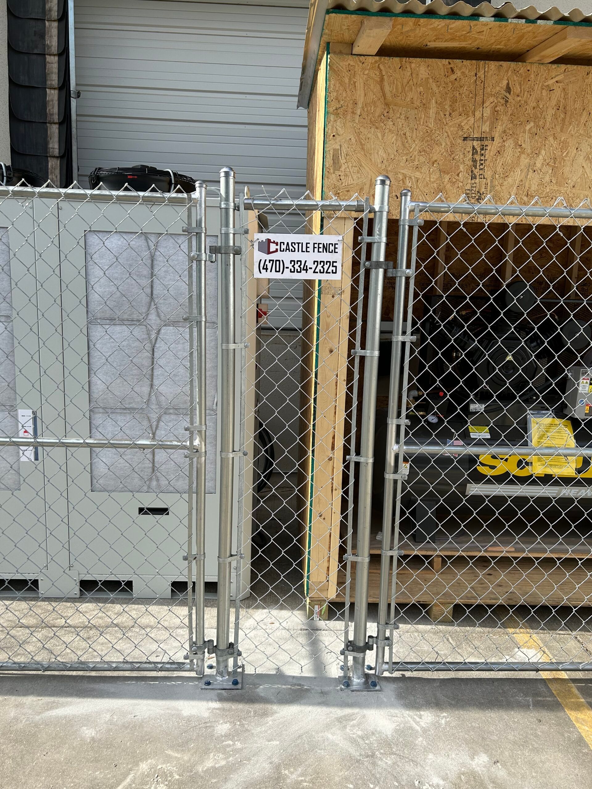 A chain link fence with a sign that says no trespassing