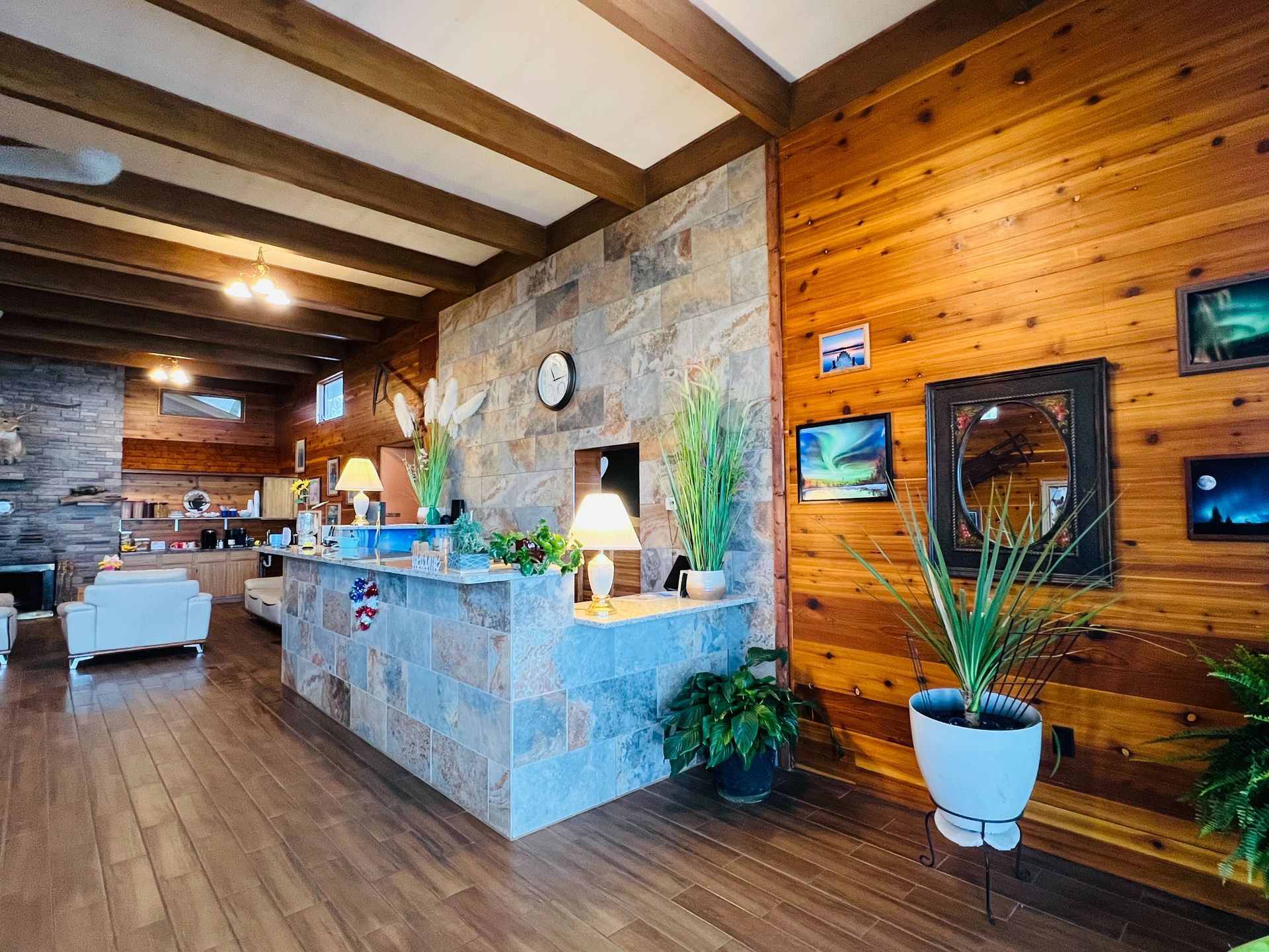 A large room with wooden walls and a wooden floor.