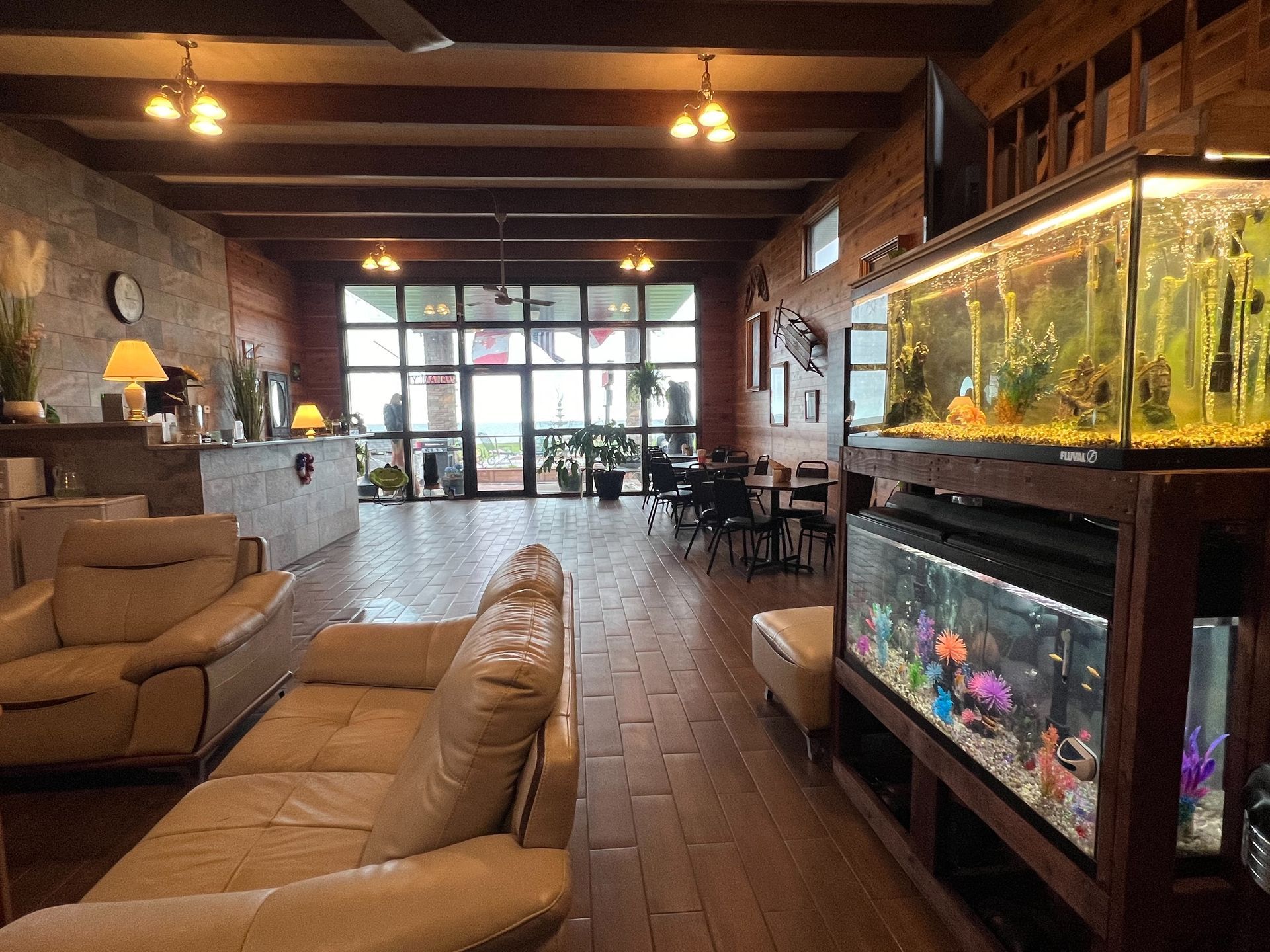 There is a large aquarium in the middle of the room.