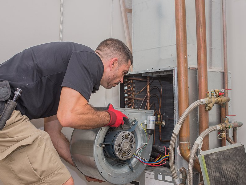 AC repair man holding Tools