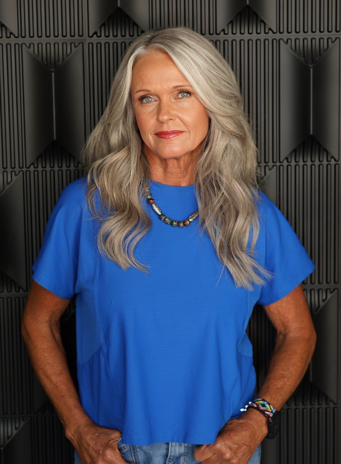 Finished custom gray hair extensions with silver and white blending at Glam.Is.On Salon in Arkansas