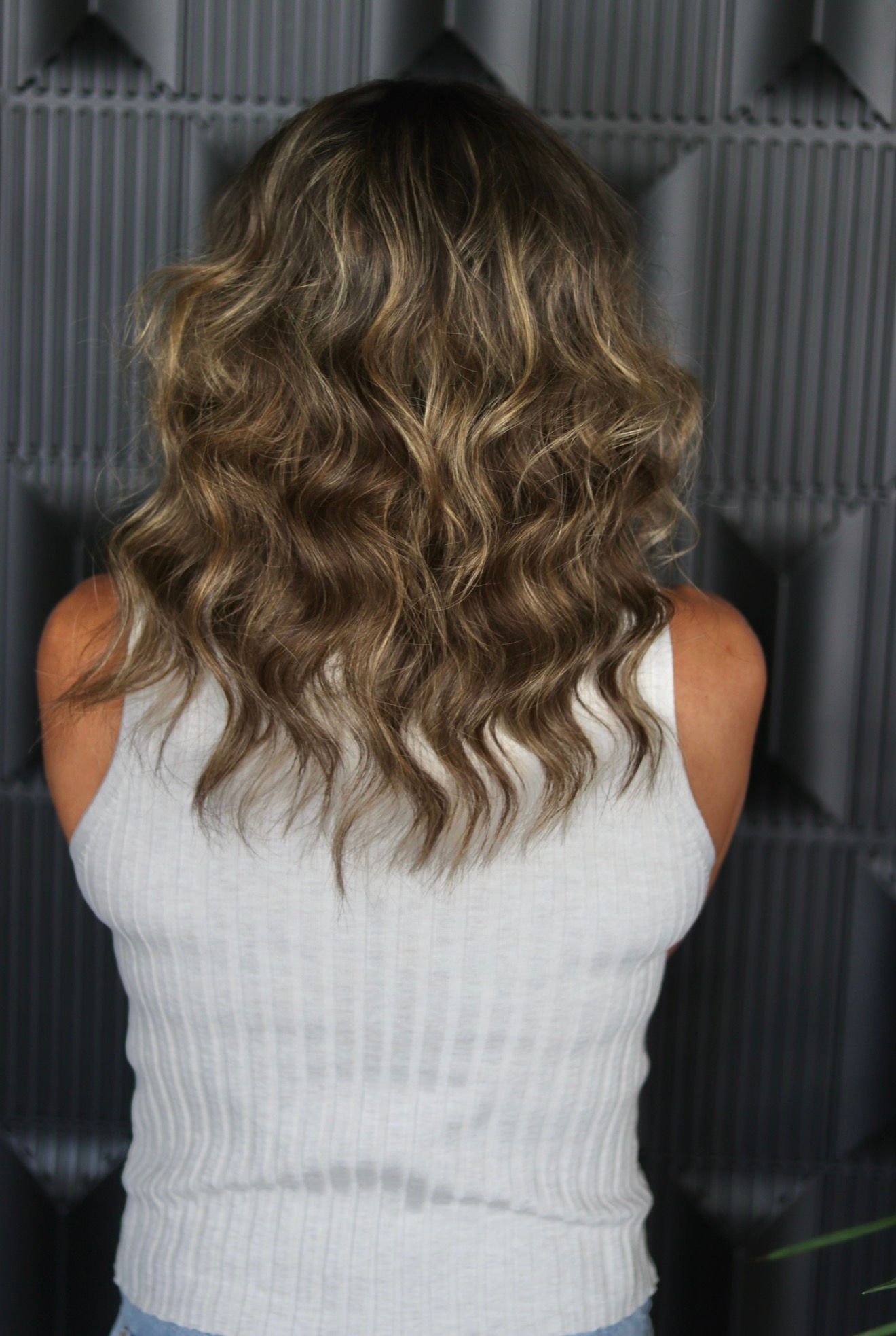 After hair extension transformation with added volume and length at Glam.Is.On Salon
