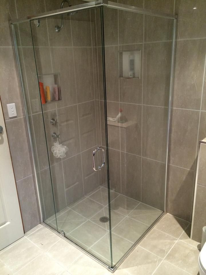 A Bathroom with A Shower Stall and A Toilet — Distinctive Glass & Aluminium in Port Kembla, NSW