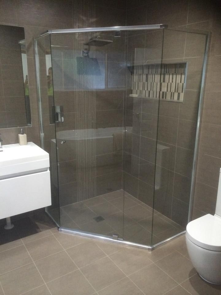 A Bathroom with A Walk in Shower and Mirror — Distinctive Glass & Aluminium in Port Kembla, NSW