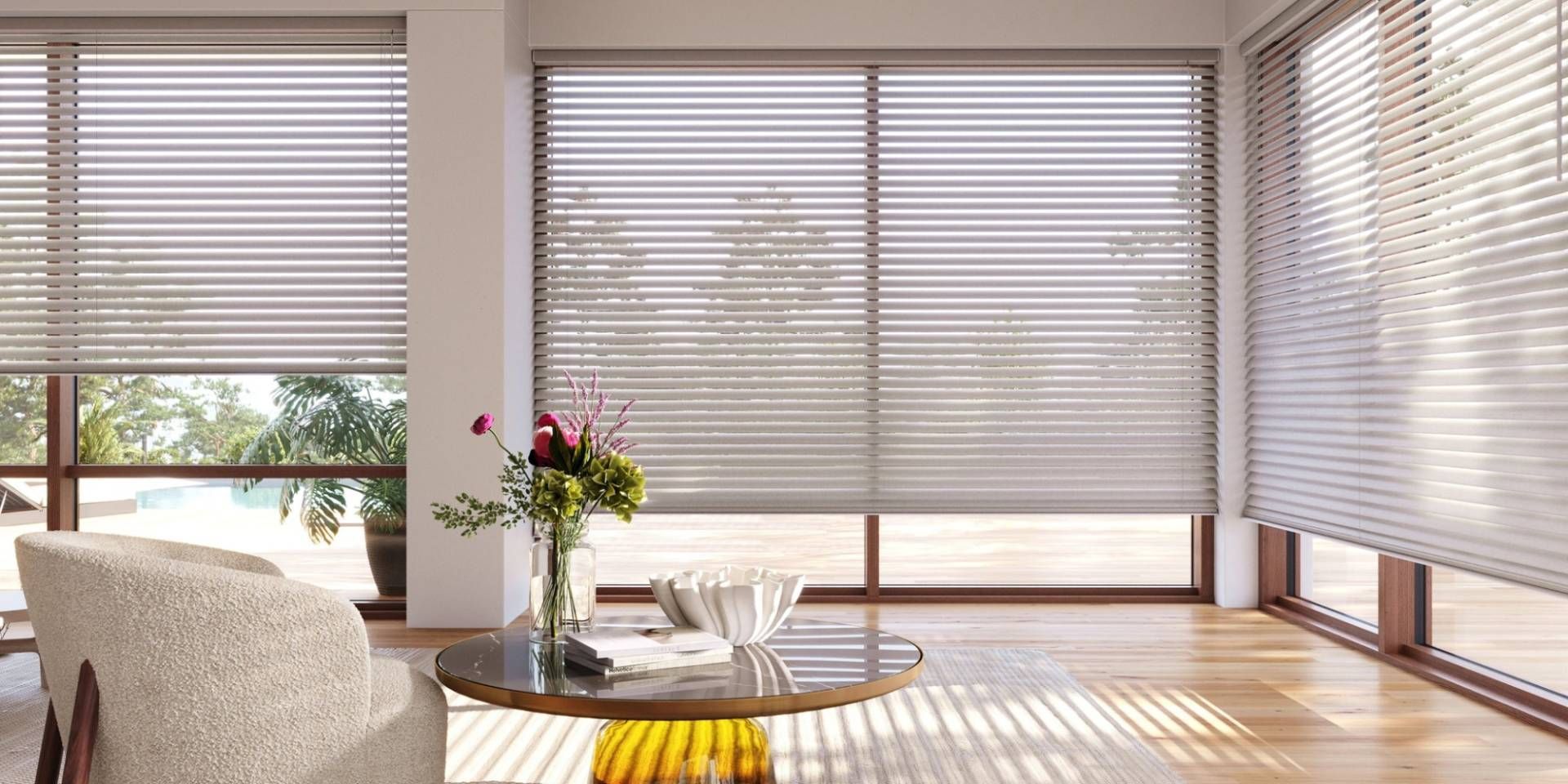 Hunter Douglas Aria™ Soft Blinds, a type of custom blind, on windows in a living room